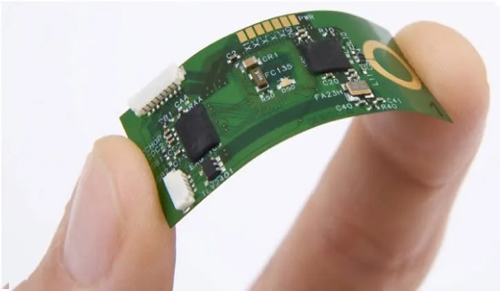 A flexible PCB bent to demonstrate its flexibility.