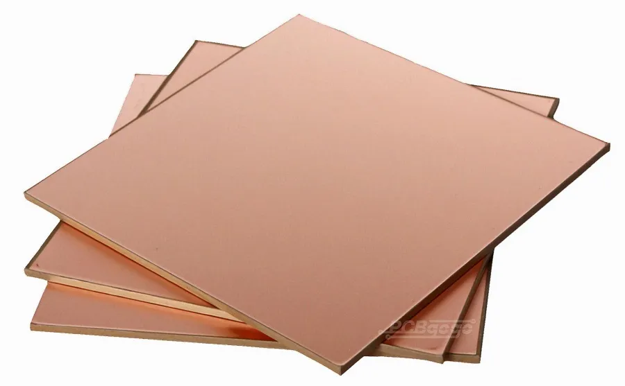 Sheets of copper clad laminate material used for PCB manufacturing.