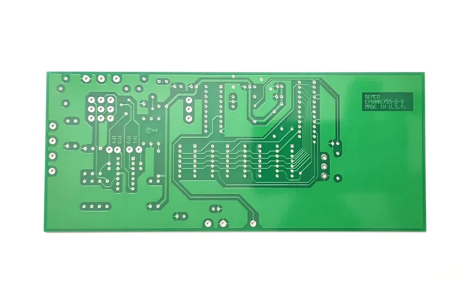 A close up on a single-sided PCB used in a simple electronic device.