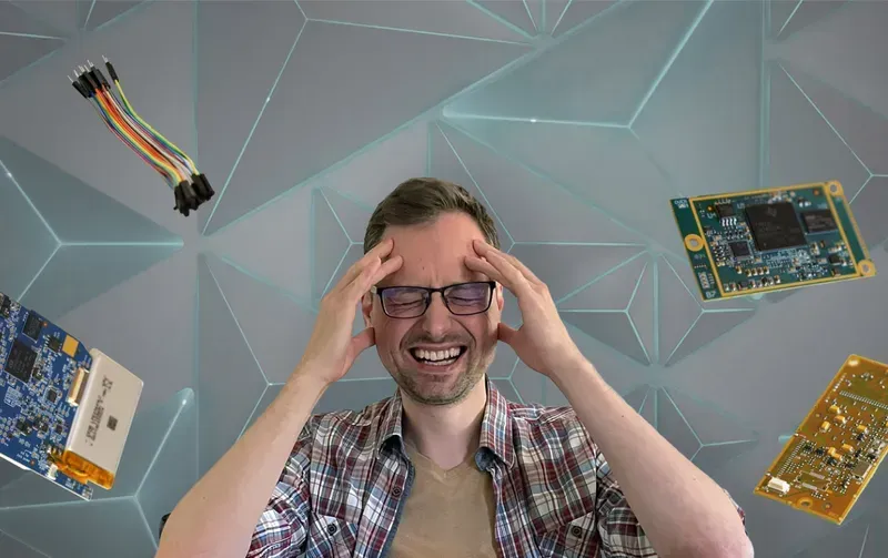 Engineer holding a PCB prototype board in hand