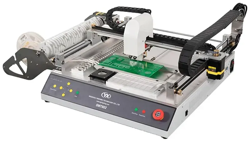 SMT machine placing components on a PCB during assembly